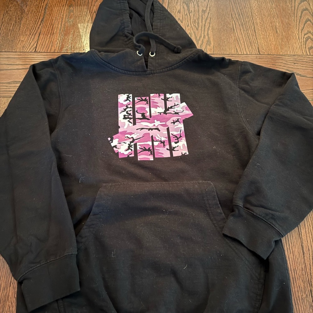 Undefeated Black Hoodie with Pink Camo Graphic